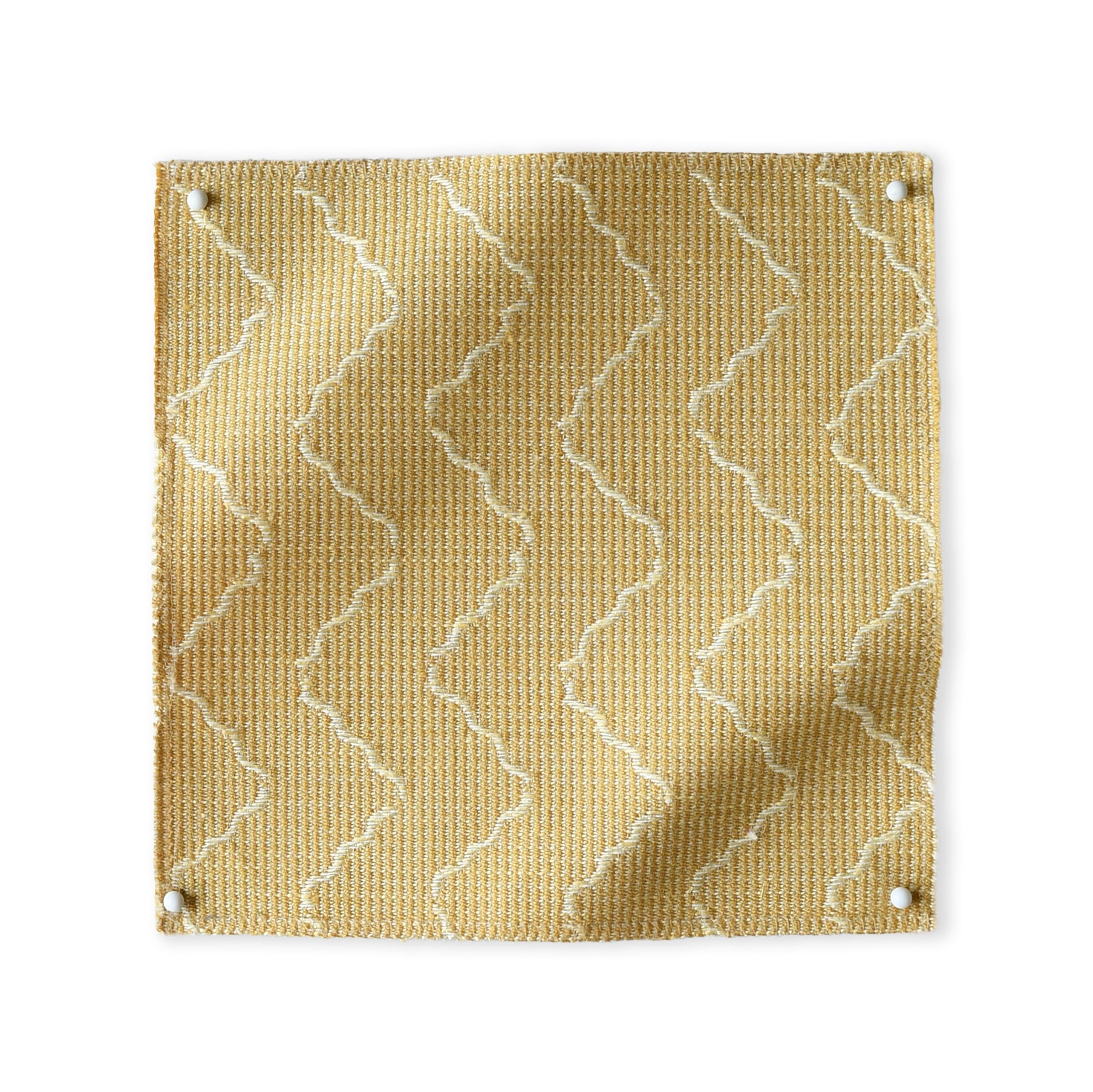 Pinned swatch of woven fabric with chevron stripe in yellow