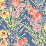 Detail of wallpaper in a large-scale floral pattern in a rainbow of pastels on a blue field.