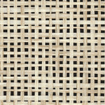 Detail of a paperweave grasscloth wallpaper in cream on a black paper backing.