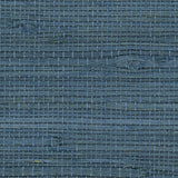 Detail of a jute grasscloth wallpaper in mottled navy blue.