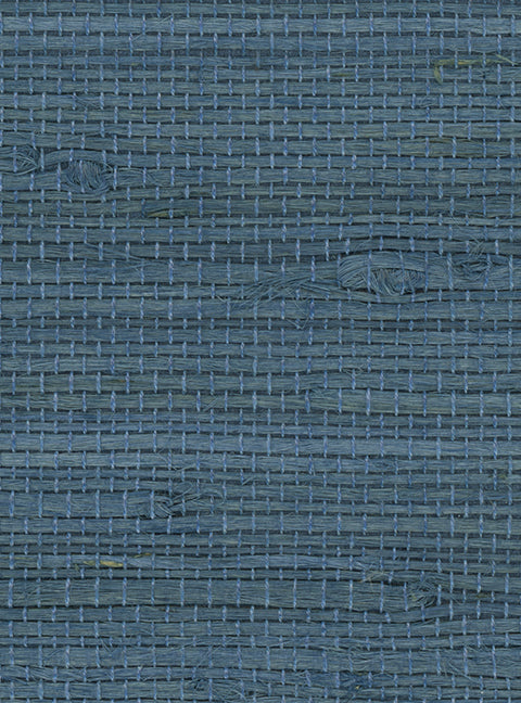 Detail of a jute grasscloth wallpaper in mottled navy blue.