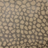 Handknotted rug with abstract animal motif in silver and cream