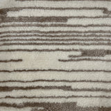 Close-up of a textured rug with brown and beige stripes