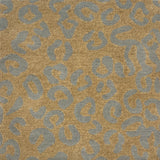 Handknotted rug with leopard spot motif in blue on tan. 