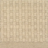 Textured beige checkerboard carpet 