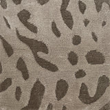 Handknotted rug with abstract animal motif in grey and taupe.  