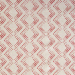 Fabric in a diamond grid pattern in coral on a tan field.