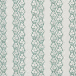 Fabric in a botanical stripe print in gray-blue on a white field.