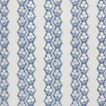 Fabric in a botanical stripe print in blue on a white field.