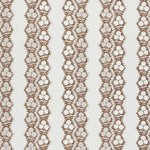 Fabric in a botanical stripe print in brown on a white field.