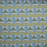 A close-up of a patterned fabric featuring repeating rows of stylized green leaves and wavy olive-yellow lines, striped blue and green triangles on a pale purple background.