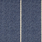 Broadloom carpet in a thin ivory stripe on a field of marine blue. 