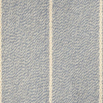 Broadloom carpet in a thin ivory stripe on a field of light blue.