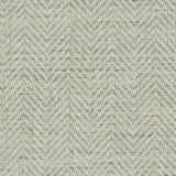 Detail of a grasscloth wallpaper with a herringbone weave in cream and aqua.