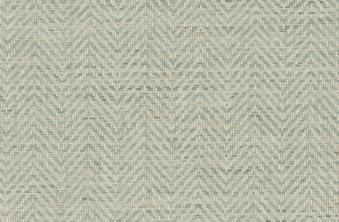 Detail of a grasscloth wallpaper with a herringbone weave in cream and aqua.