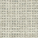 Detail of a paperweave grasscloth wallpaper in cream on a metallic paper backing.