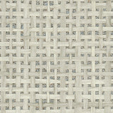 Detail of a paperweave grasscloth wallpaper in cream on a metallic paper backing.