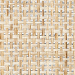 Detail of a paperweave grasscloth wallpaper in tan on a metallic paper backing.