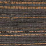 Detail of a jute grasscloth wallpaper in shades of black and brown on a paper backing.