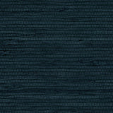 Detail of a jute grasscloth wallpaper in dark navy on a paper backing.