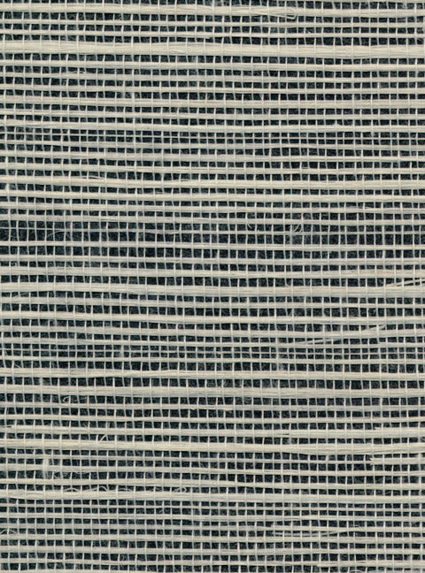 Detail of a sisal grasscloth wallpaper in white on a black paper backing.
