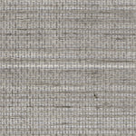 Detail of a sisal grasscloth wallpaper in mottled shades of gray on a paper backing.