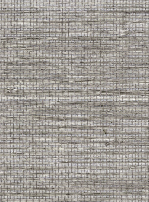 Detail of a sisal grasscloth wallpaper in mottled shades of gray on a paper backing.