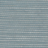 Detail of a sisal grasscloth wallpaper in gray on a blue-green paper backing.