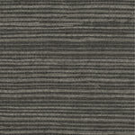 Detail of a sisal grasscloth wallpaper in light gray on a dark gray paper backing.