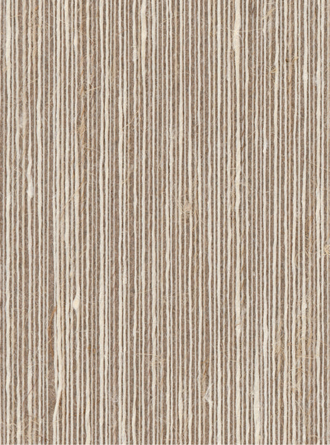 Detail of a grasscloth wallpaper in textured cream string pattern on a brown paper backing.