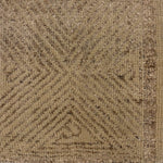 Close-up of a textured brown carpet with a subtle pattern