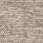 A rug woven in rows with yard that is a melange of ivory and grey.