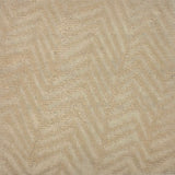 Handknotted rug with a tonal zig zag stripe in shades of cream. 