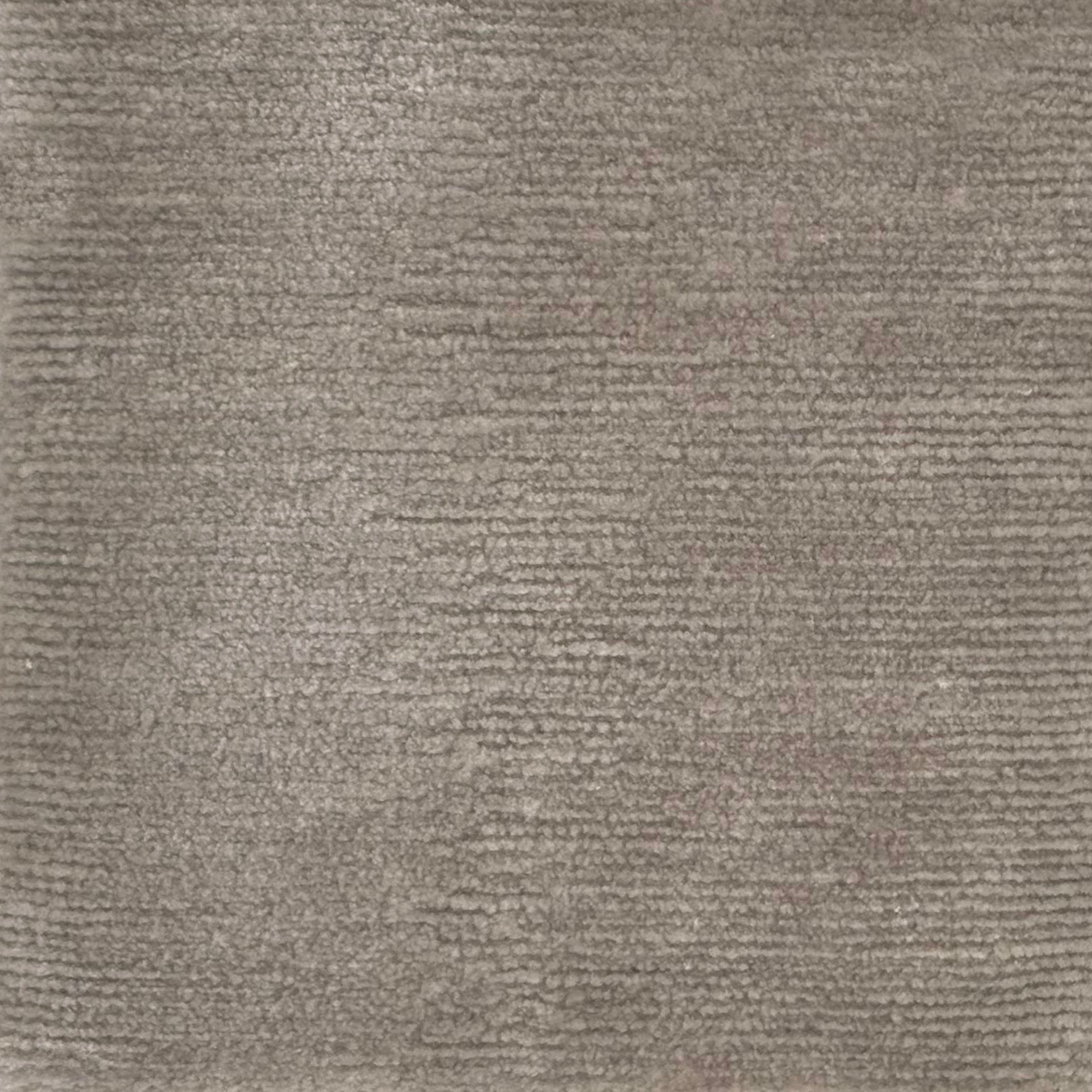 Handknotted rug with solid cut pile in warm grey eco-nylon