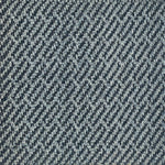 A close-up of a woven rug sample with a diagonal twill pattern in dark navy blue and light gray.