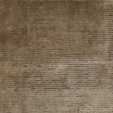 Handknotted cutpile rug in brown.