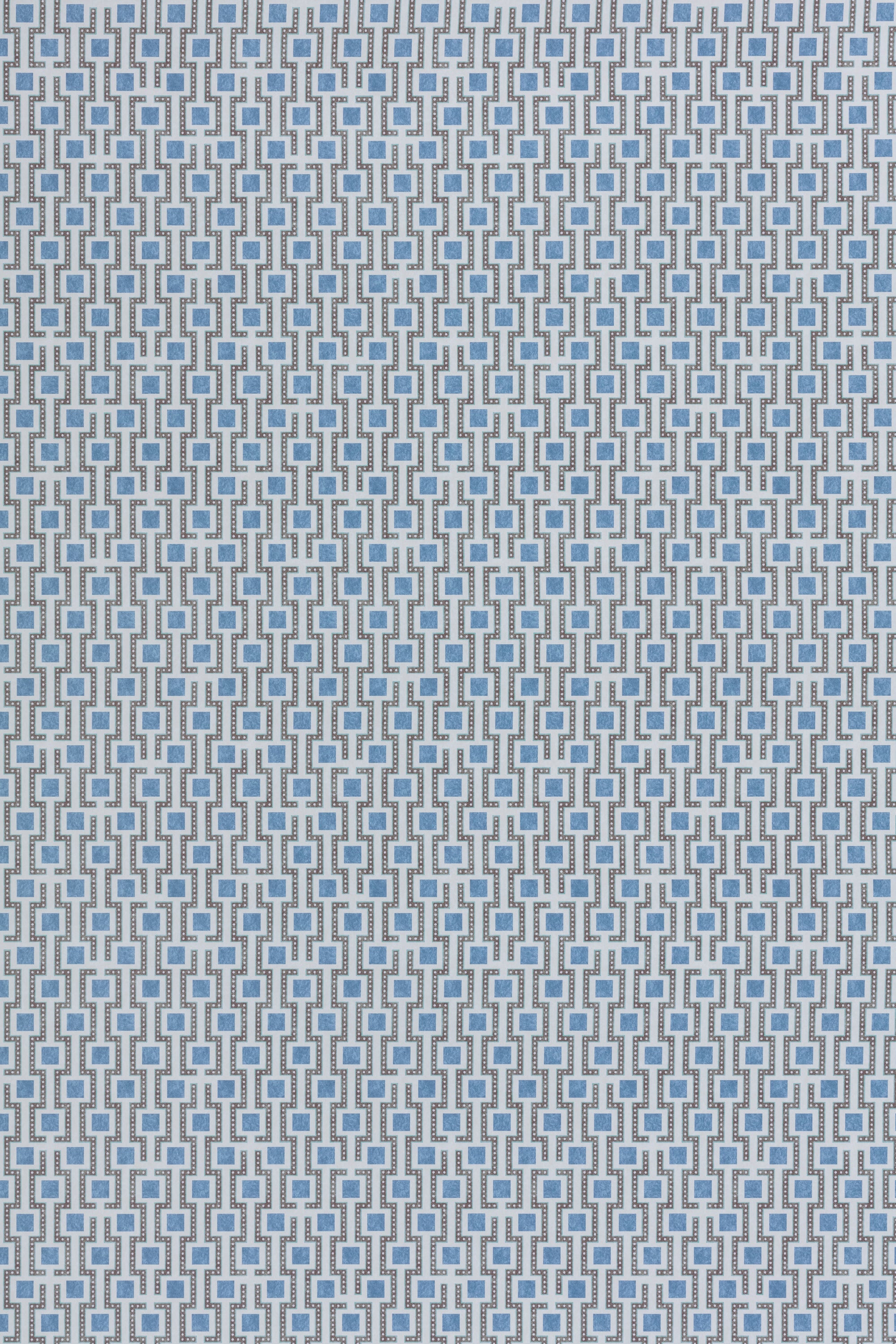 Wallpaper panel in a geometric grid print in shades of blue and gray.