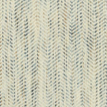Broadloom carpet in a textural herringbone strié in cream with heathered blue, brown and grey.