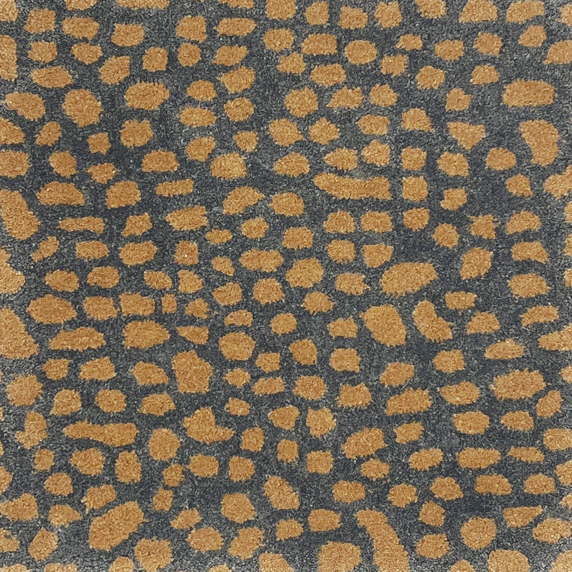 Handknotted rug with abstract animal motif in grey and tan.