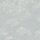 Detail of wallpaper in a painterly cloud pattern in white on a sky blue watercolor field.