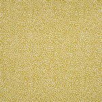 Fabric in a dappled animal print in shades of olive and mustard on a cream field.