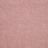 Fabric in a dappled animal print in shades of pink and purple on a cream field.