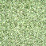 Fabric in a dappled animal print in shades of green on a cream field.