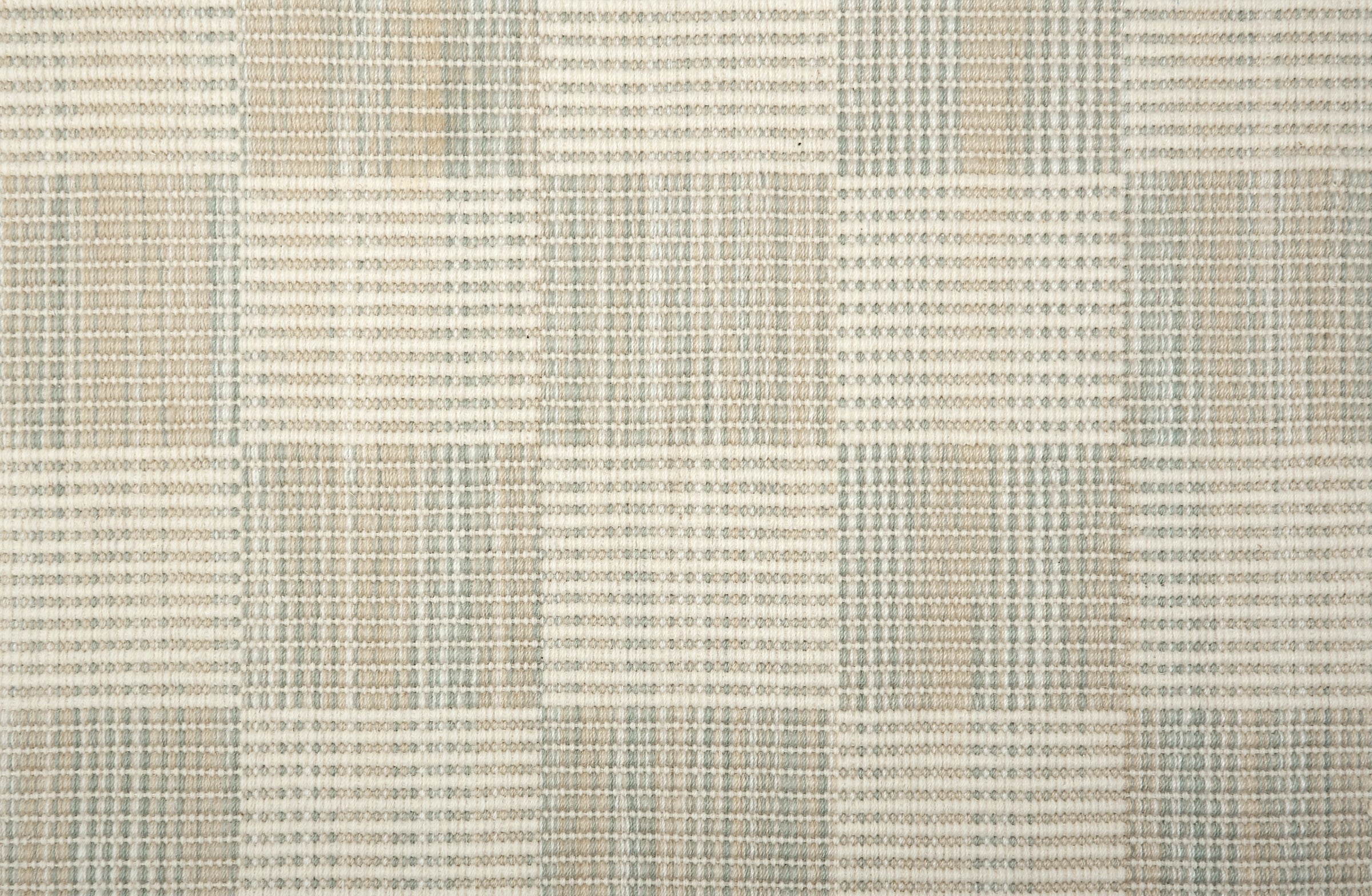Broadloom carpet in a ribbed checkerboard pattern in cream and cool grey.