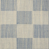 Broadloom carpet in a ribbed checkerboard pattern in cream and light blue. 