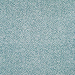 Fabric in a dappled animal print in shades of turquoise and navy on a cream field.