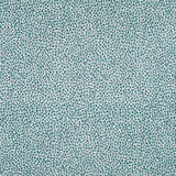 Fabric in a dappled animal print in shades of turquoise and navy on a cream field.