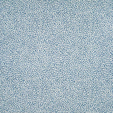 Fabric in a dappled animal print in shades of blue and navy on a cream field.