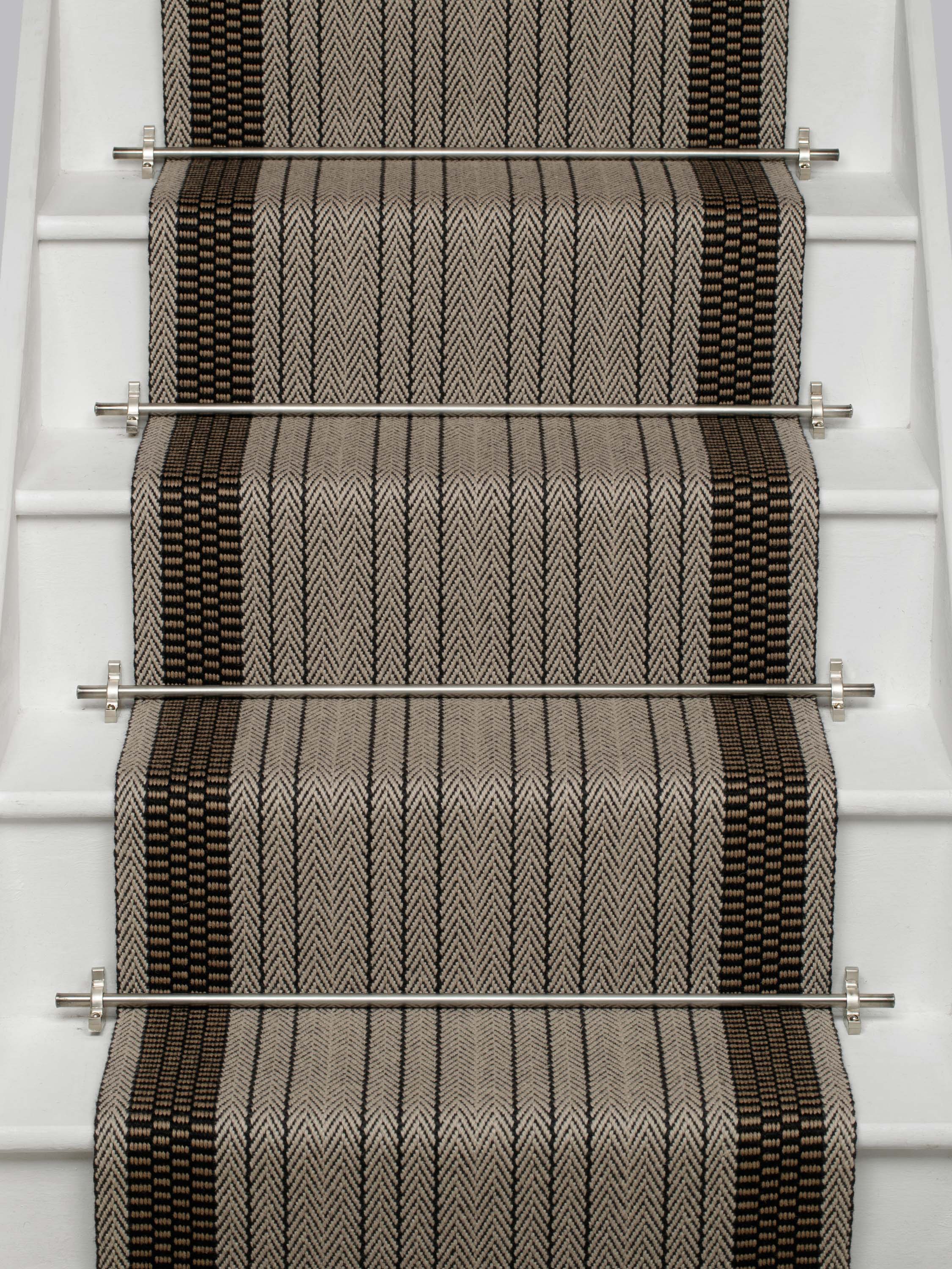 Striped flatweave runner in grey black on white staircase