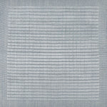 Handknotted rug sample with a tonal light blue gridded motif.